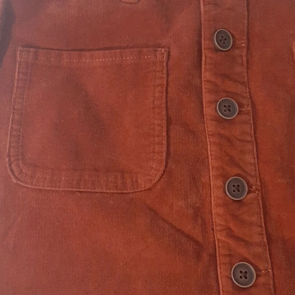 SO Girls Size 16 Corduroy skirt. Burnt‎ Orange, NWOT. Waist sinches to fit.